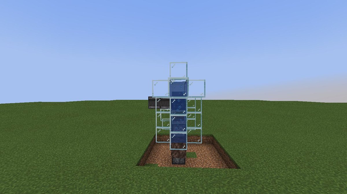 The egg machine tower on a grass field, front view