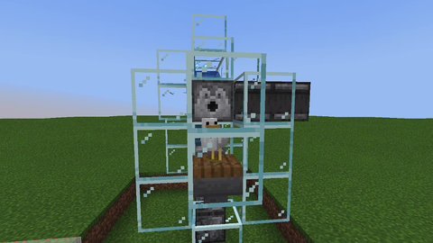 A chicken inside a glass egg machine in Minecraft